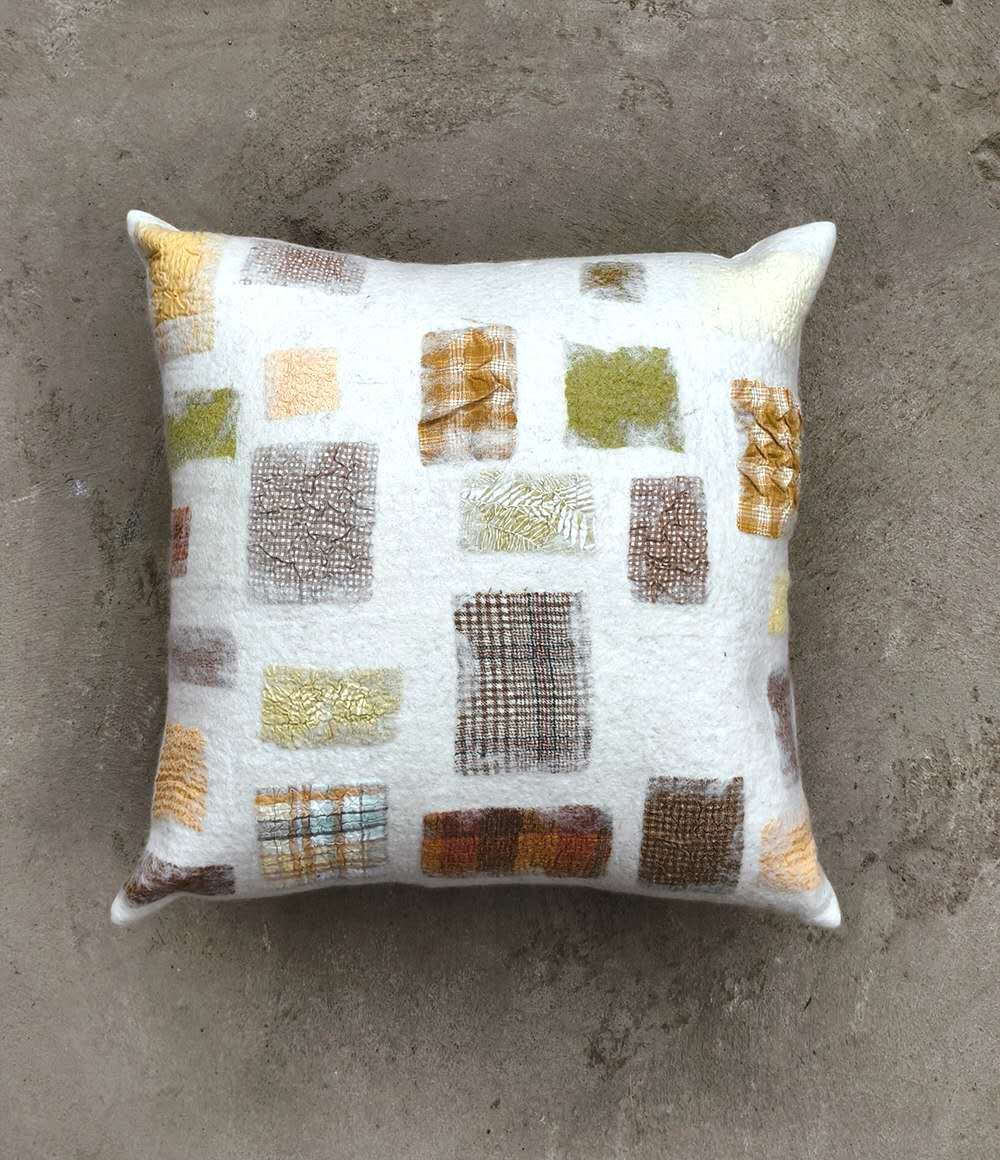 Oreiller en feutre de laine de couleur naturelle